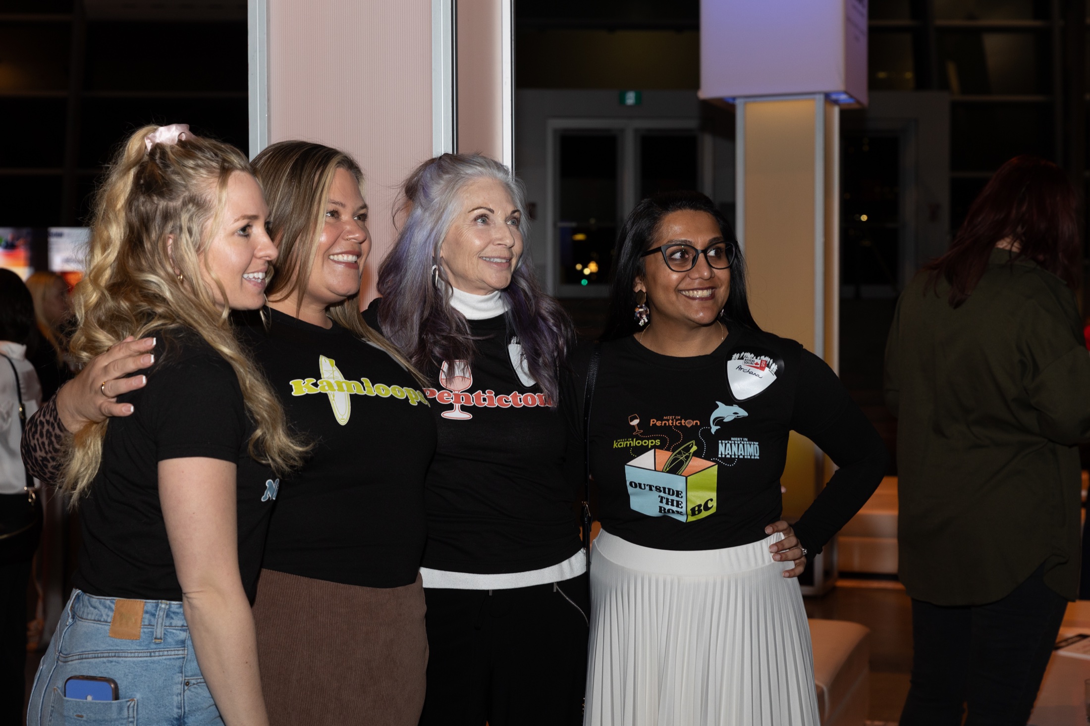 Four destination sales partners together at a business event